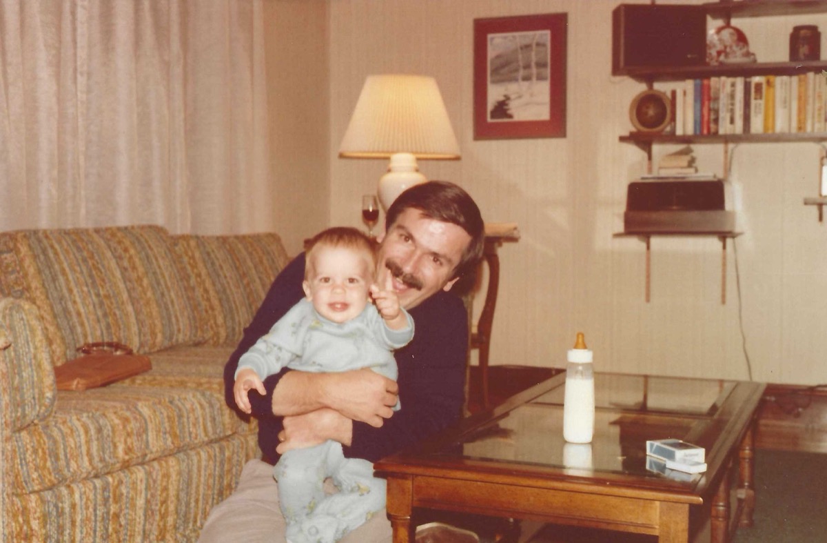 Bill holding a baby